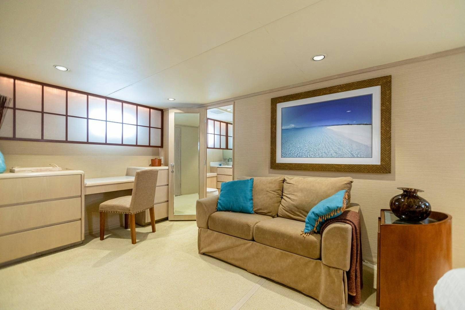 a living room with a couch and a tv aboard ISLAND TIME Yacht for Sale