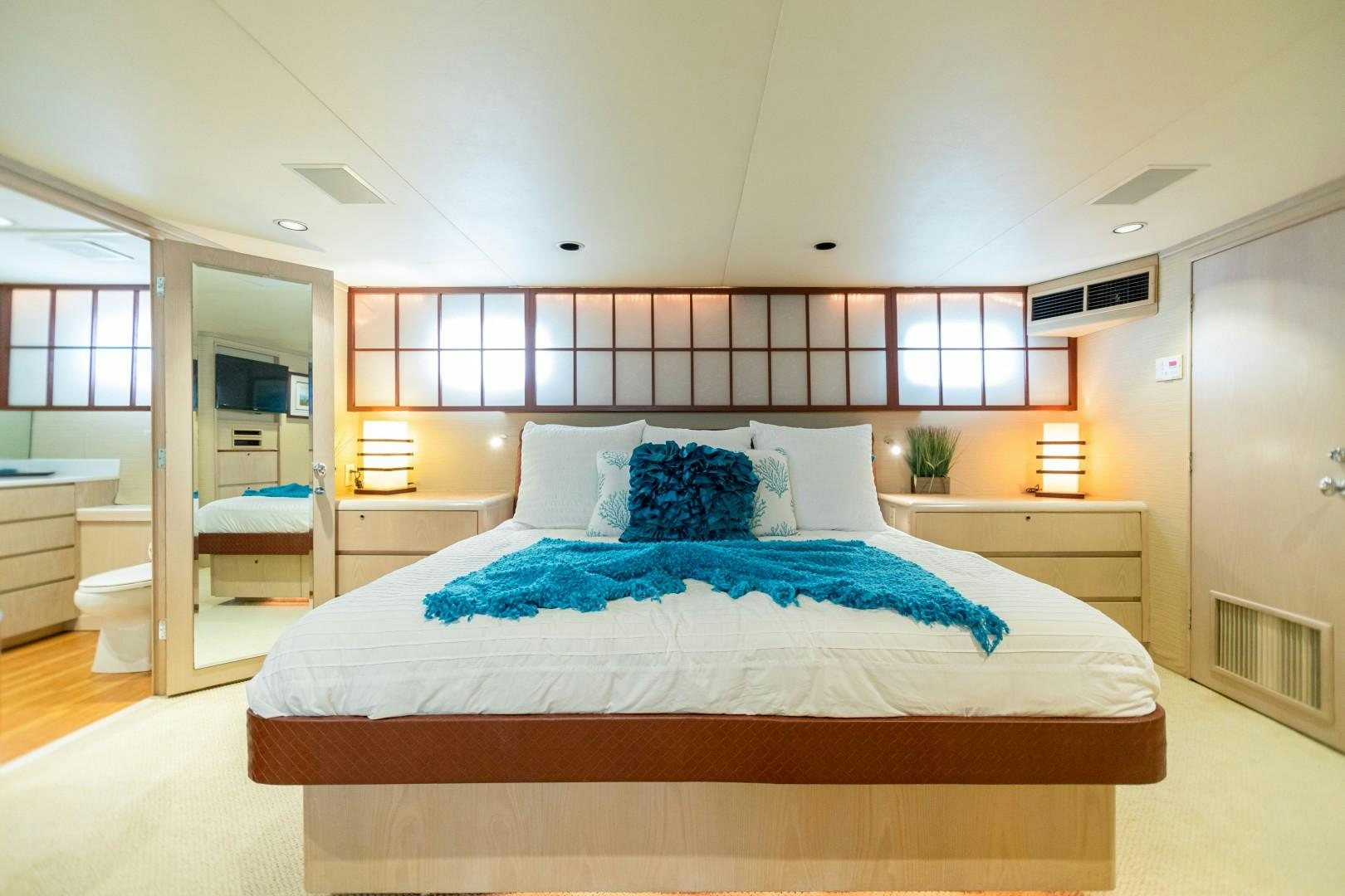 a bed in a room aboard ISLAND TIME Yacht for Sale