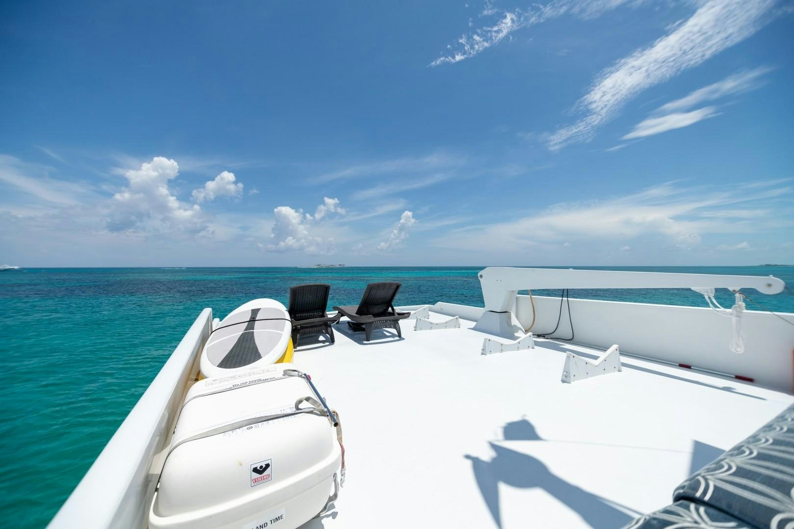a boat on the water aboard ISLAND TIME Yacht for Sale
