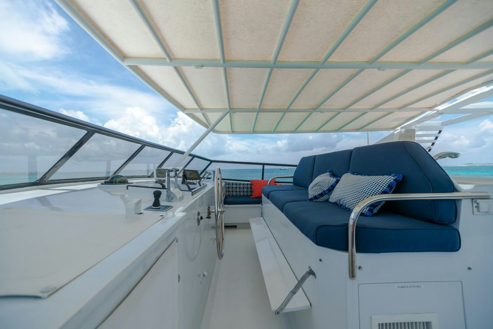 a boat with a seat aboard ISLAND TIME Yacht for Sale