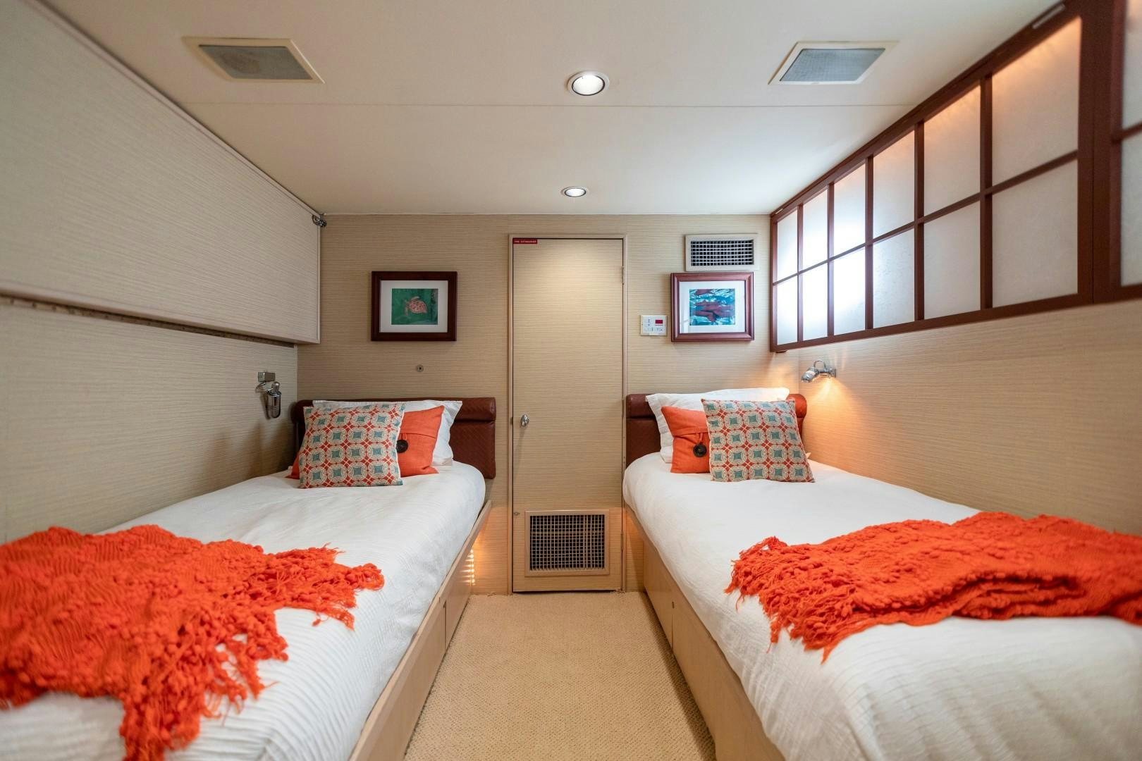 a room with two beds aboard ISLAND TIME Yacht for Sale