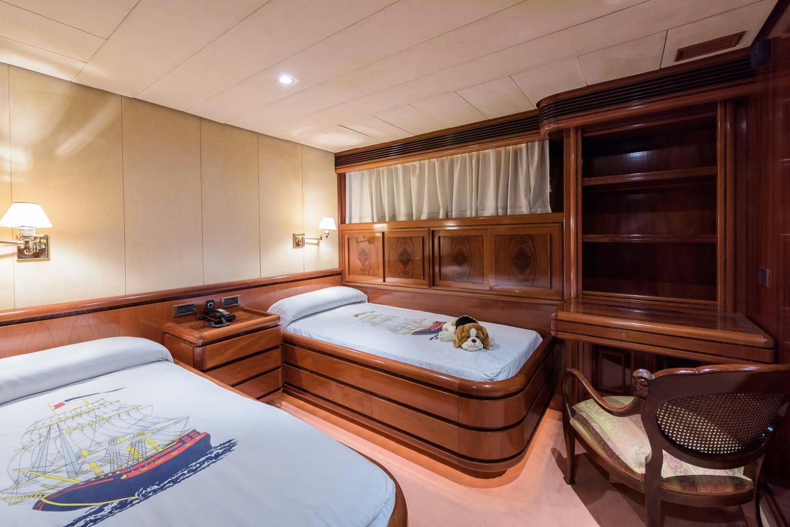 a couple of beds in a hotel room aboard ELBA Yacht for Sale