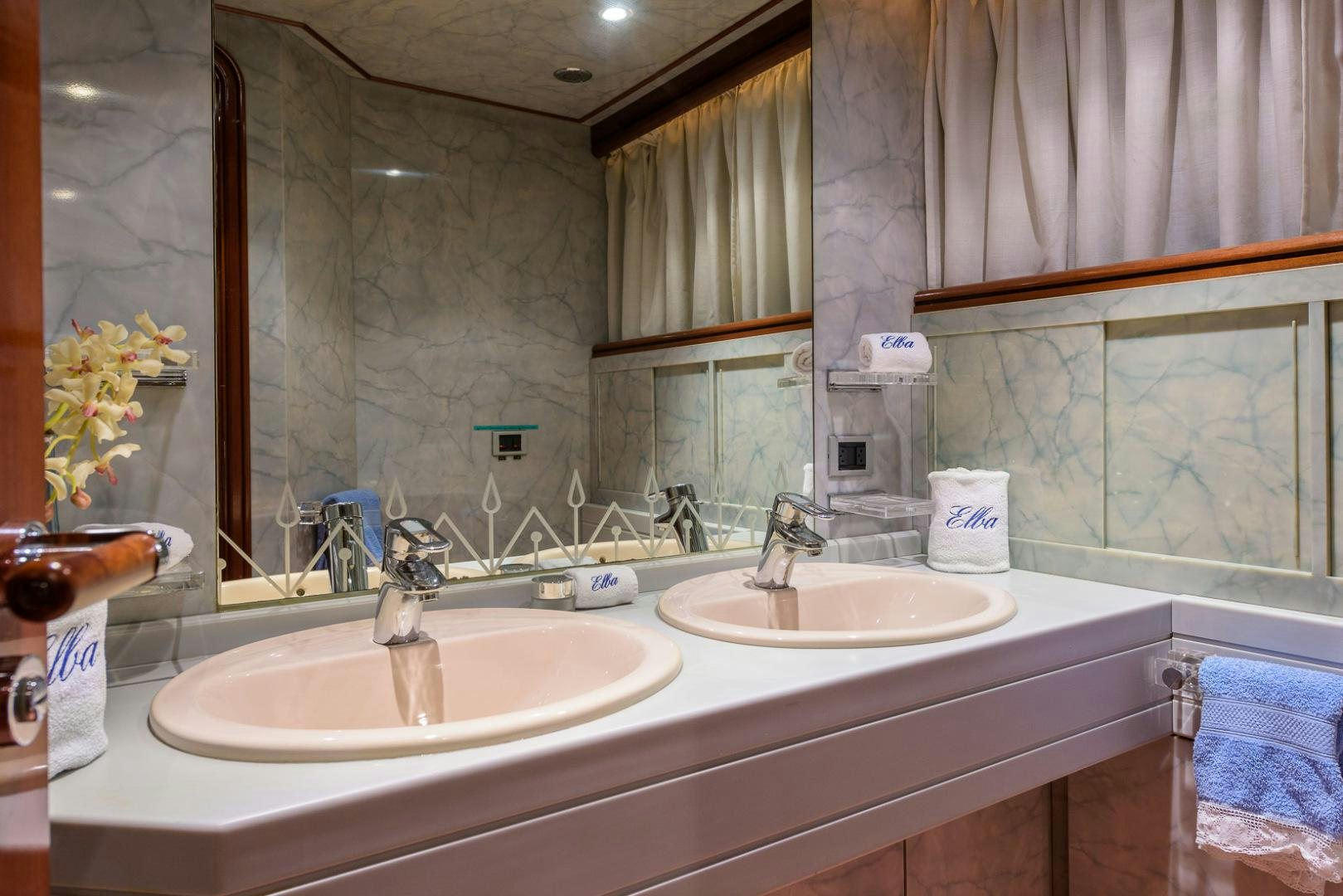 a bathroom with two sinks aboard ELBA Yacht for Sale