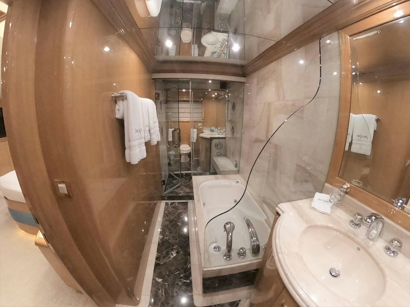 a bathroom with a stand up shower aboard SEAS THE DAY Yacht for Sale