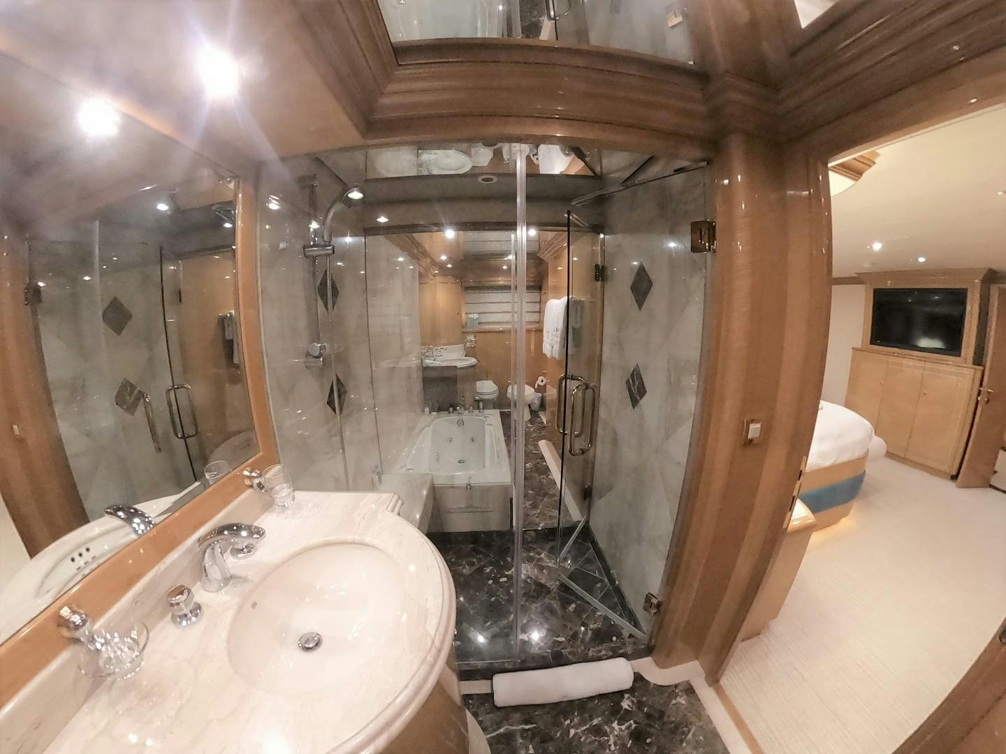 a bathroom with a large shower aboard SEAS THE DAY Yacht for Sale