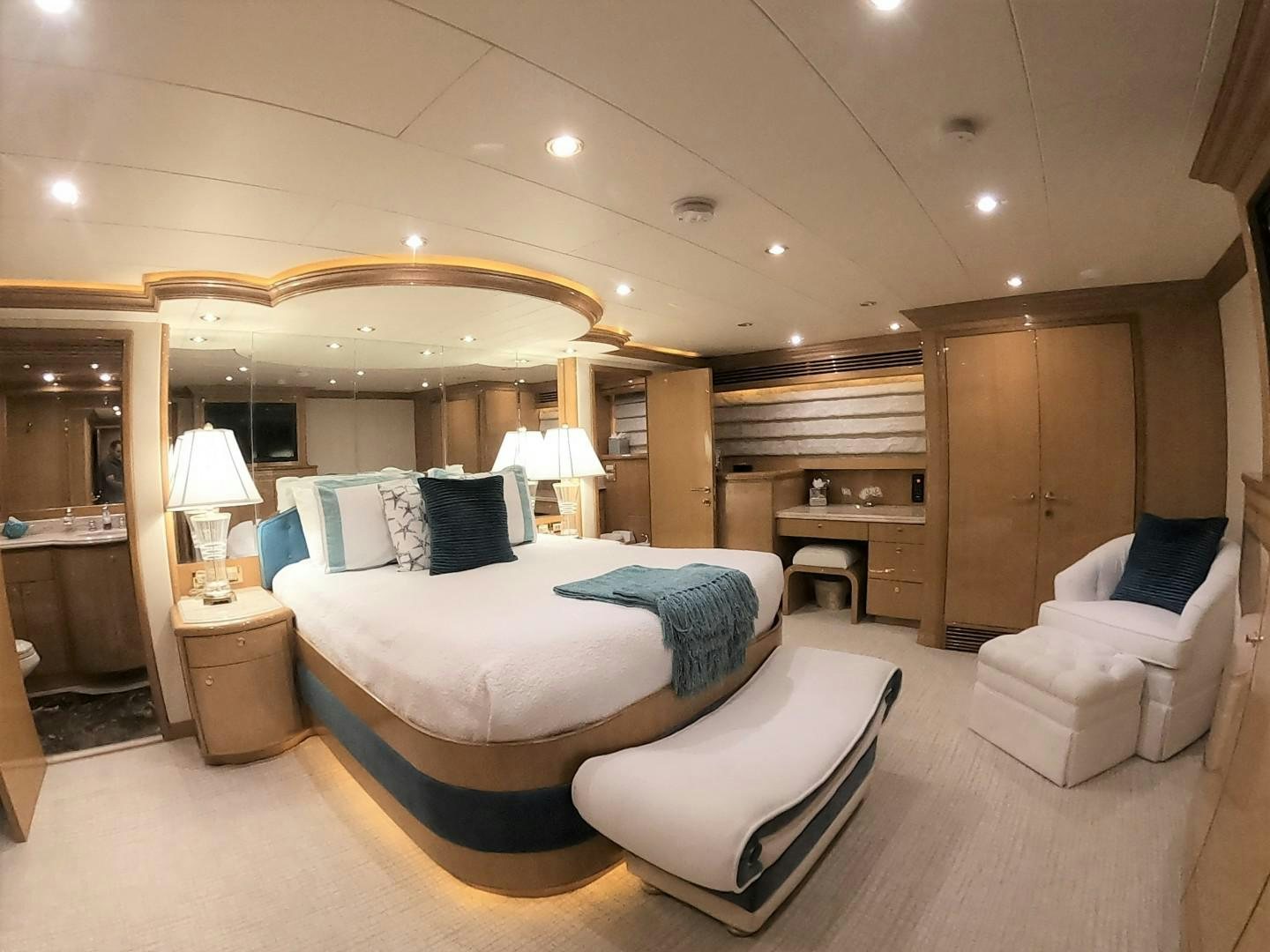 a large bedroom with a large bed aboard SEAS THE DAY Yacht for Sale