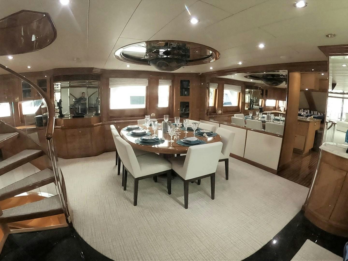 a dining room with a table and chairs aboard SEAS THE DAY Yacht for Sale