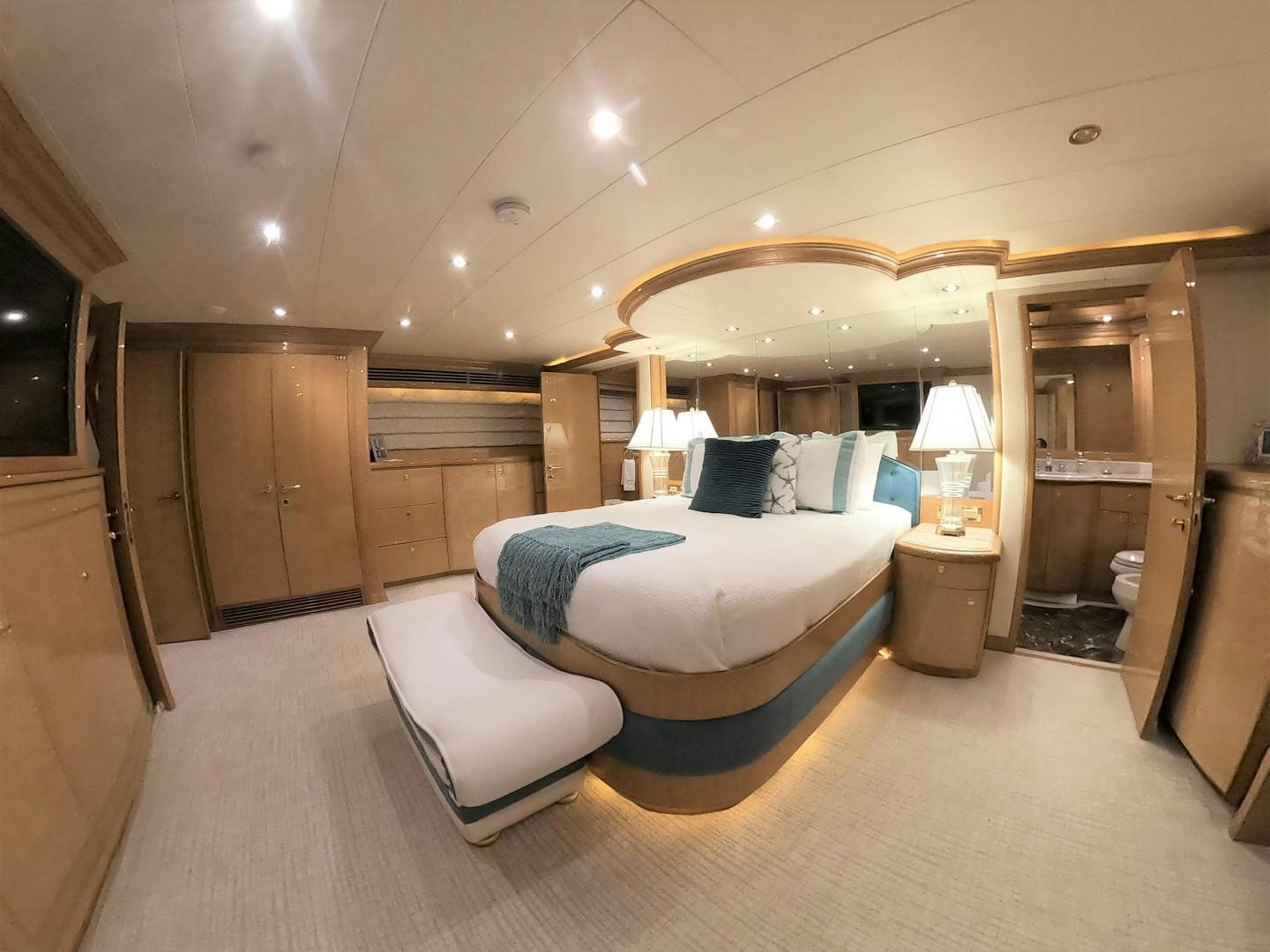 a large bedroom with a large bed aboard SEAS THE DAY Yacht for Sale