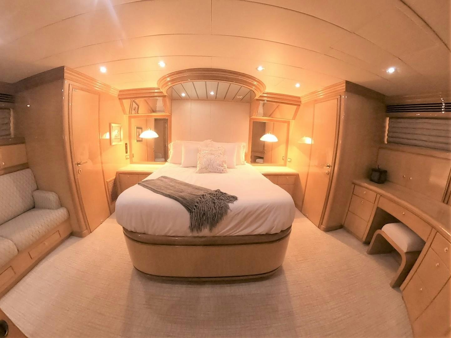 a large bedroom with a large bed aboard SEAS THE DAY Yacht for Sale