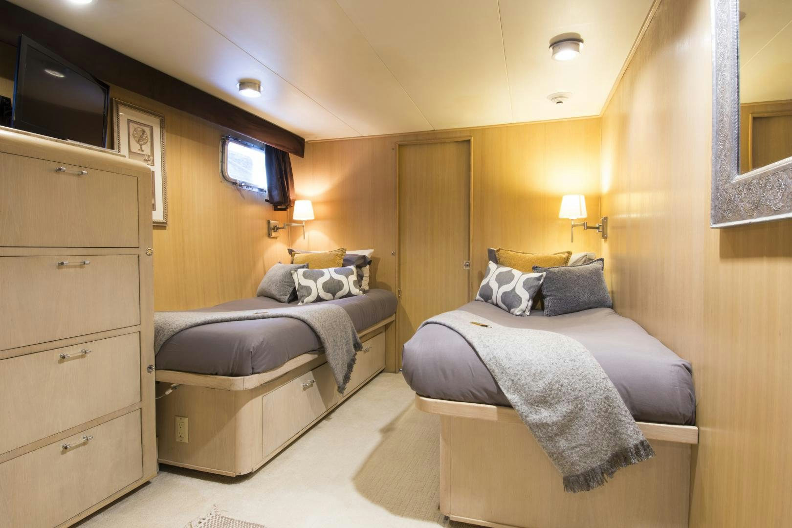 a couple of beds in a hotel room aboard KALEEN Yacht for Sale