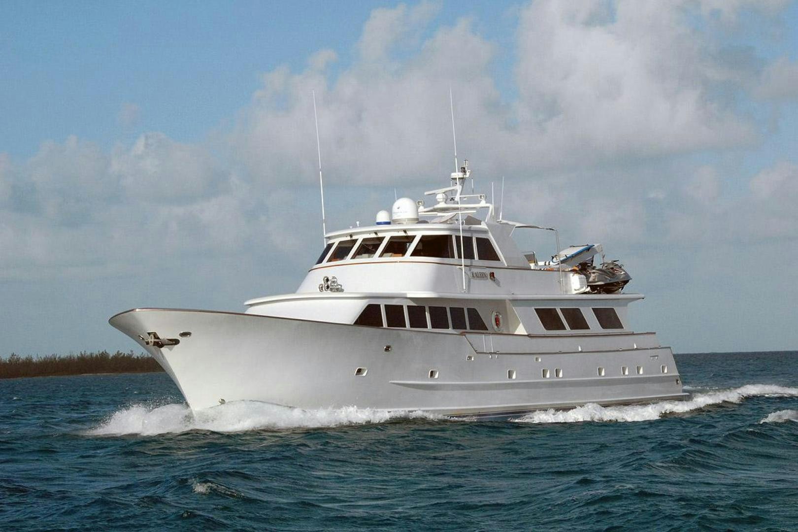 a white boat on water aboard KALEEN Yacht for Sale