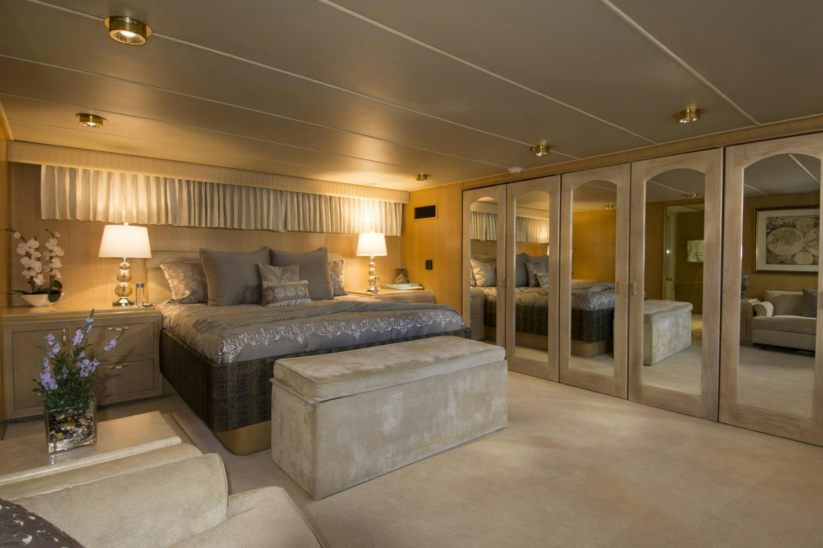 a living room with a large bed aboard KALEEN Yacht for Sale