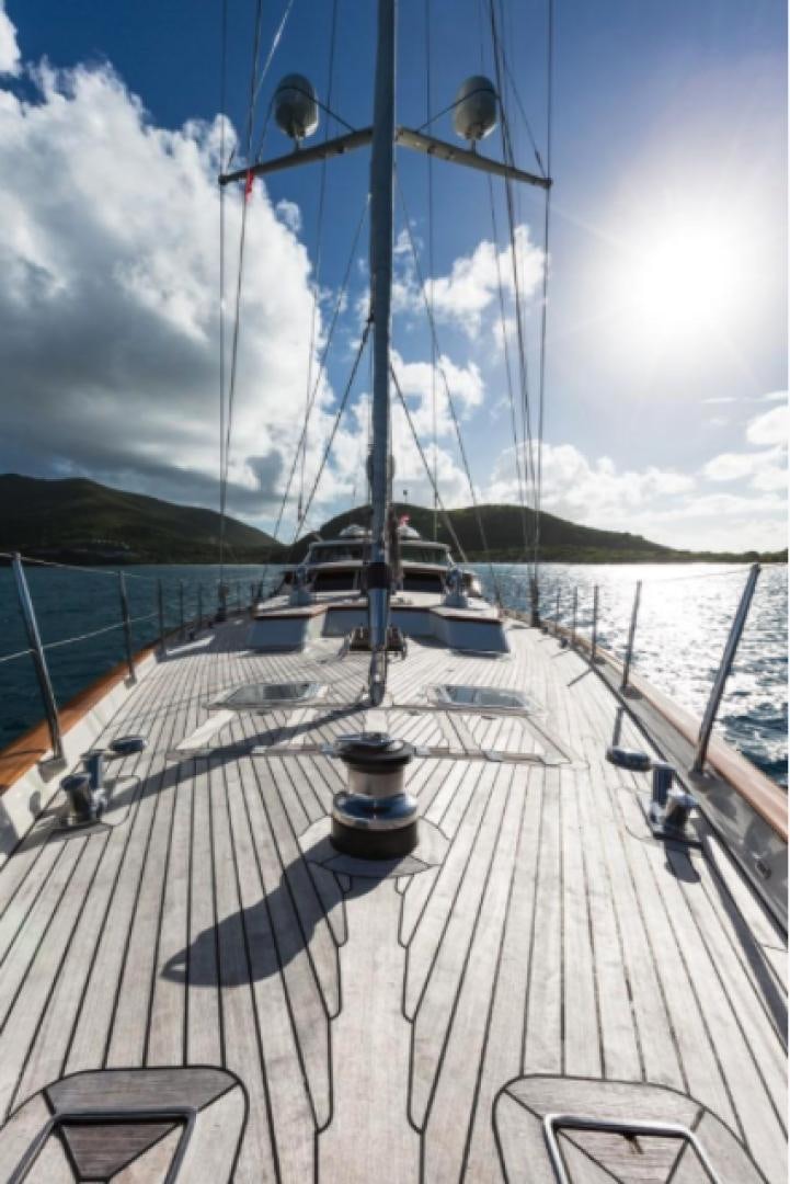a ship docked at a pier aboard MARAE Yacht for Sale