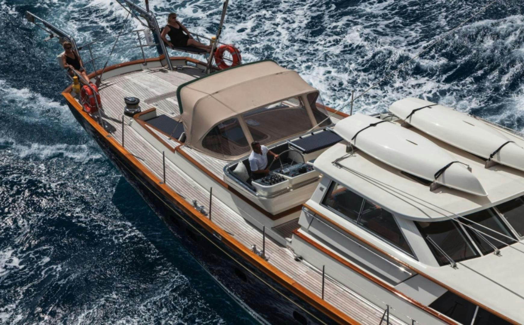 a group of people on a boat aboard MARAE Yacht for Sale