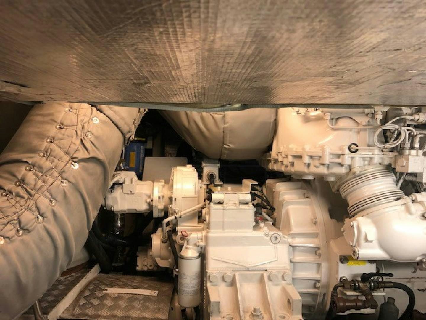 a vehicle with a large piece of machinery in it aboard DOUBLE D Yacht for Sale