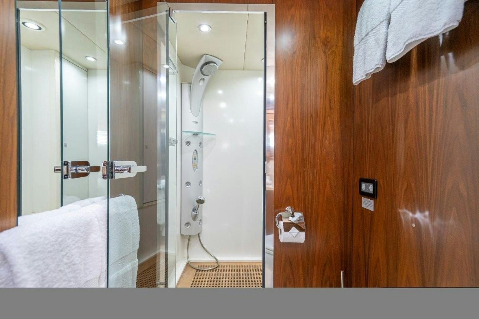 a bathroom with a shower and a sink aboard DOUBLE D Yacht for Sale
