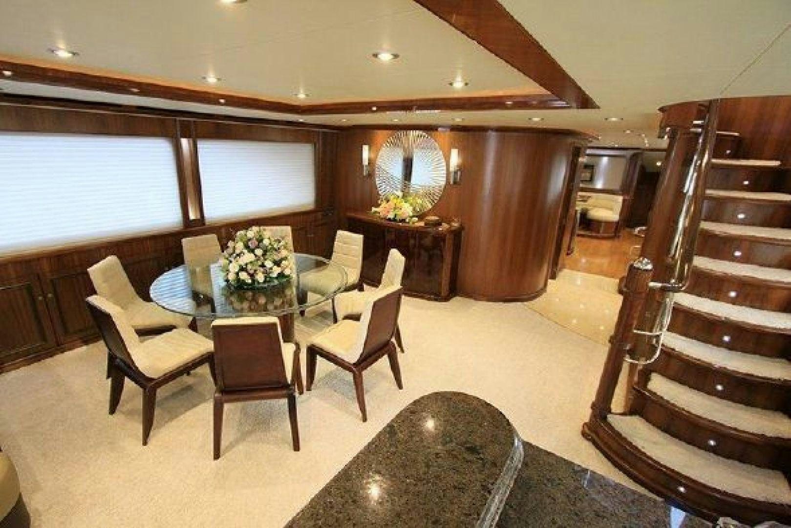 a large room with a piano and a piano aboard WHITE LOTUS VIII Yacht for Sale