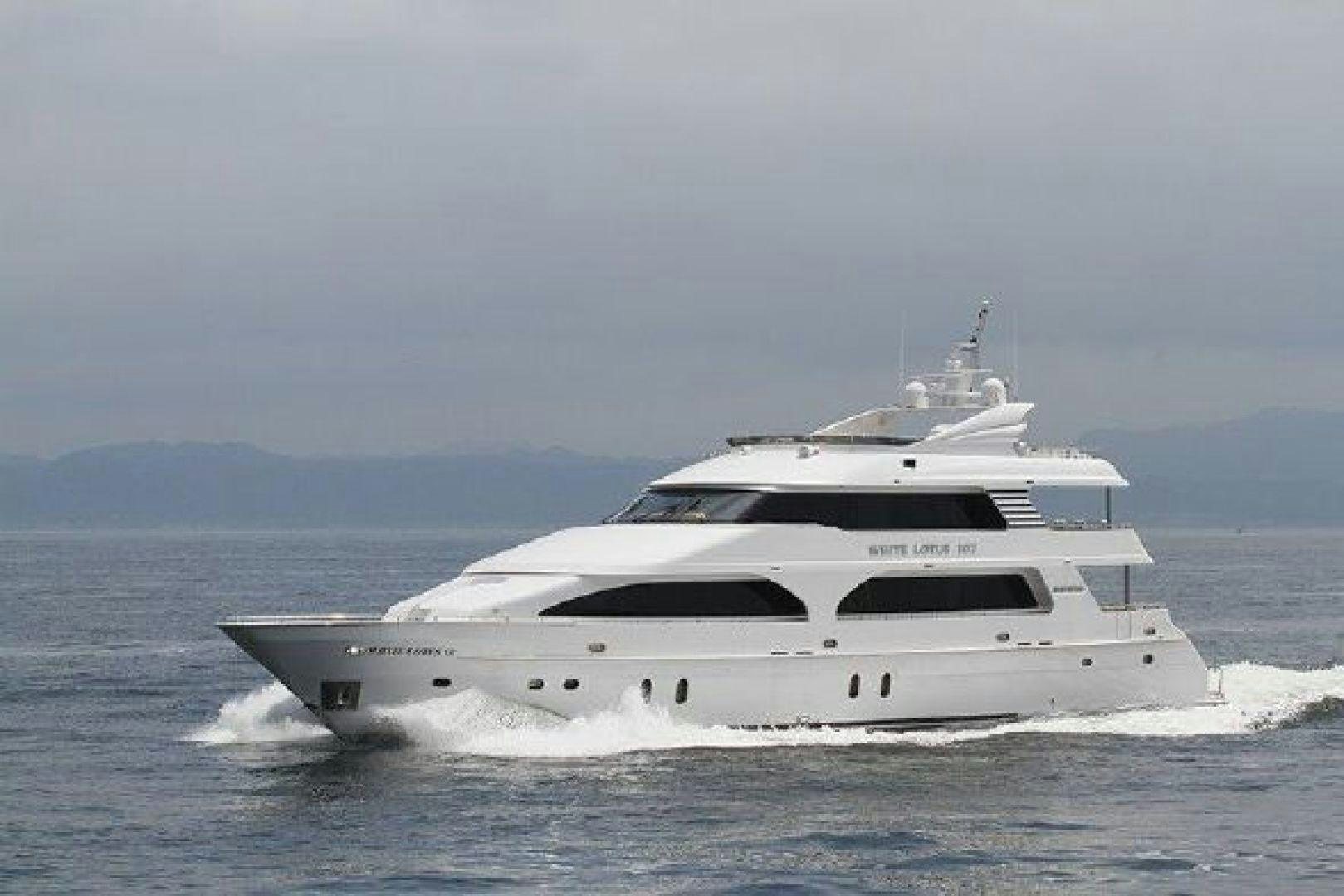 a white yacht on the water aboard WHITE LOTUS VIII Yacht for Sale