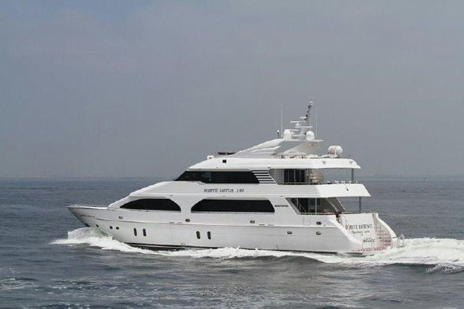 a white yacht on the water aboard WHITE LOTUS VIII Yacht for Sale