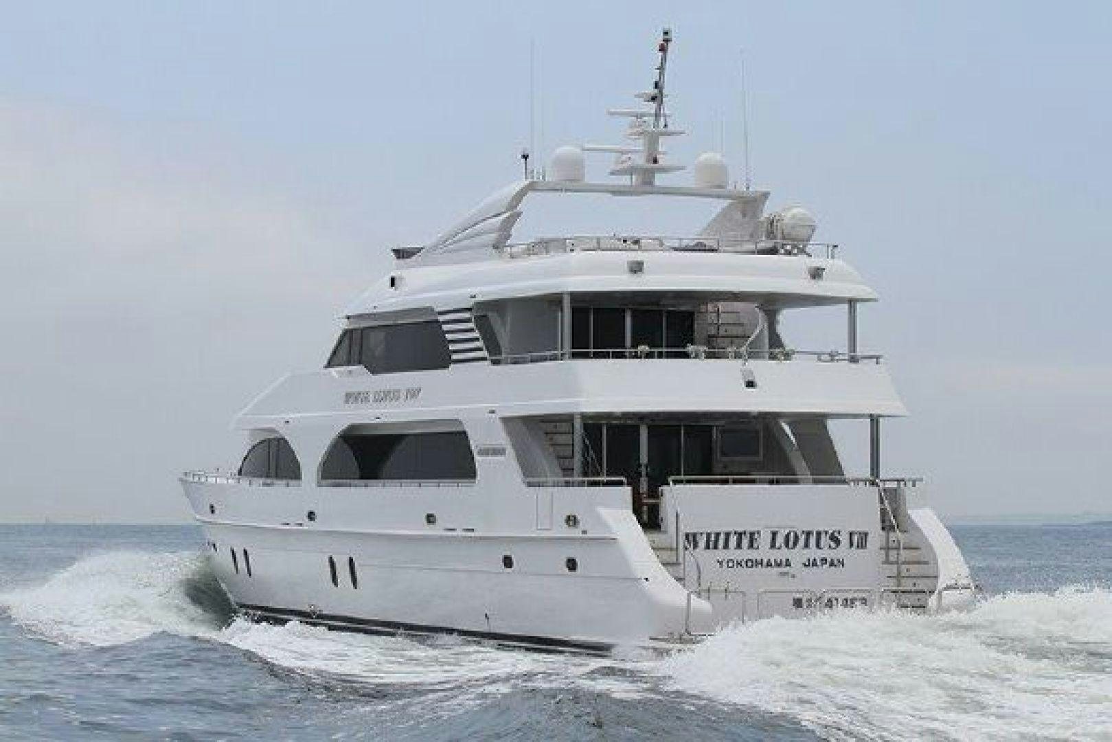 a white boat on the water aboard WHITE LOTUS VIII Yacht for Sale