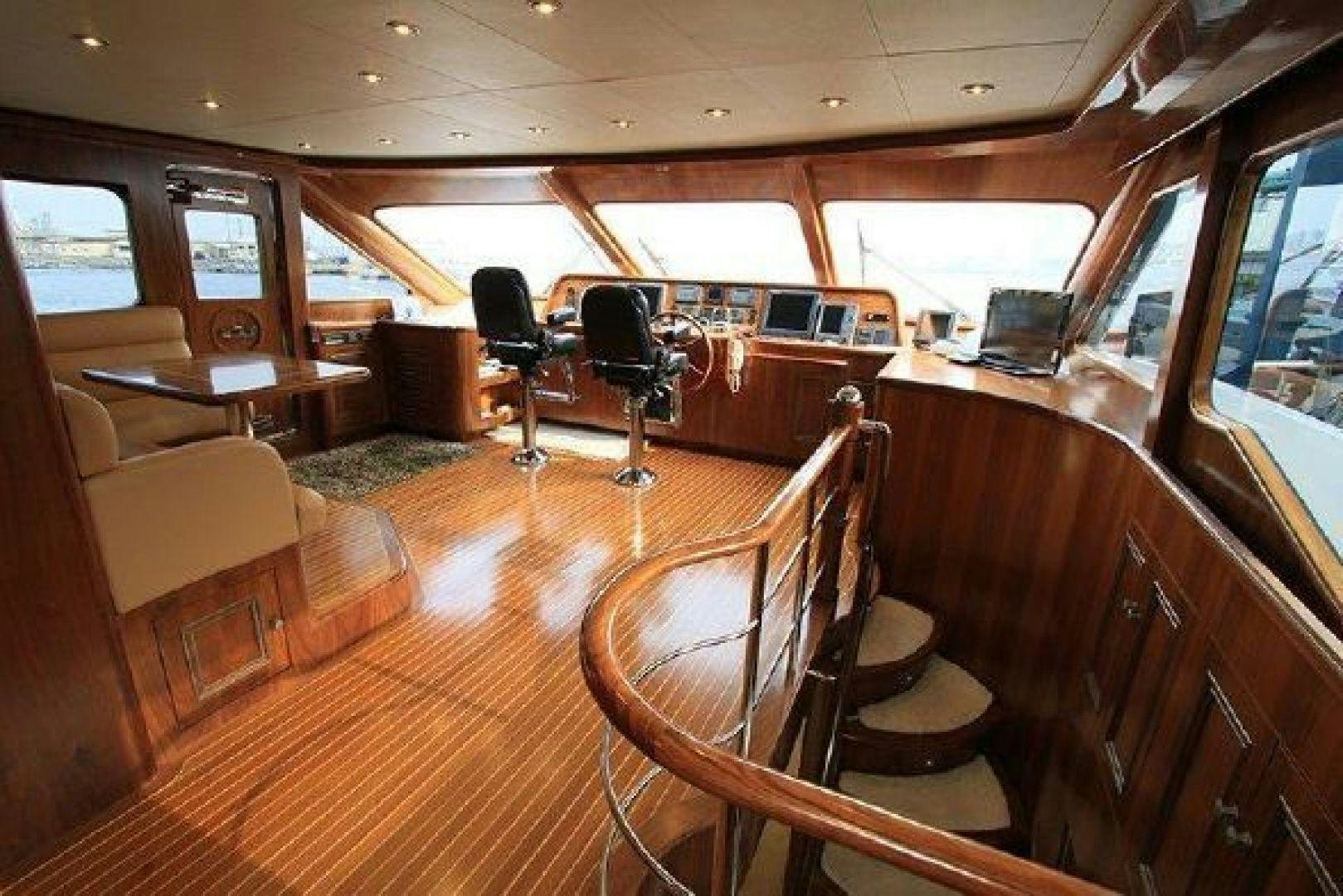 inside of a vehicle with wooden seats aboard WHITE LOTUS VIII Yacht for Sale