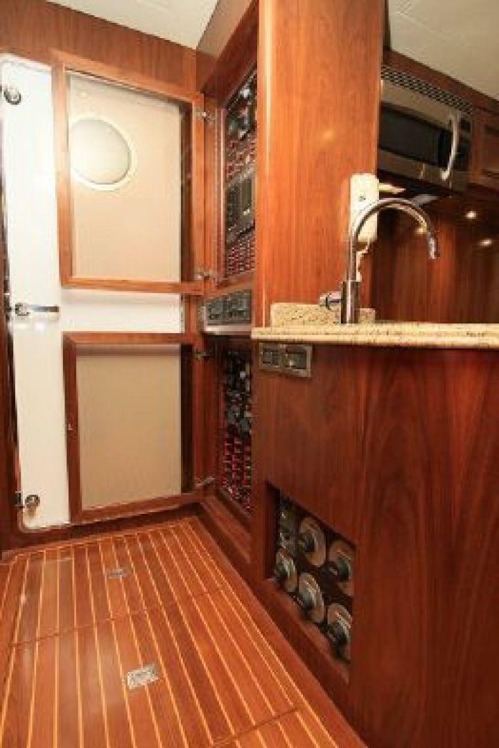 a kitchen with a sink and microwave aboard WHITE LOTUS VIII Yacht for Sale