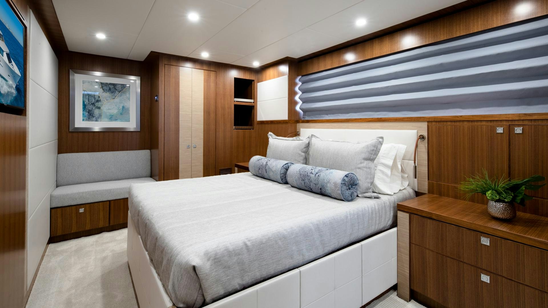 a bed in a room aboard RISK TAKER Yacht for Charter