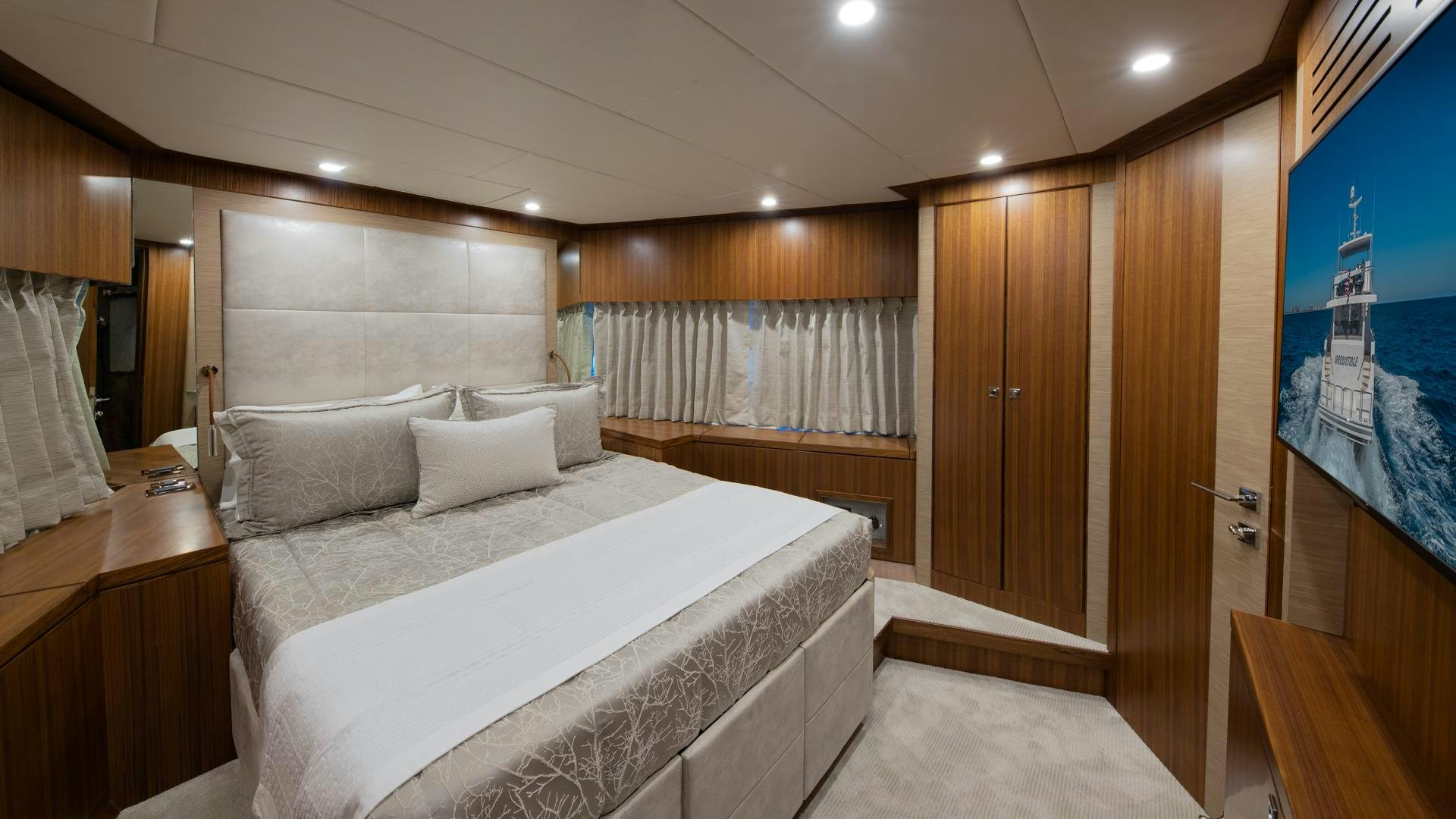 a bed in a room aboard RISK TAKER Yacht for Charter