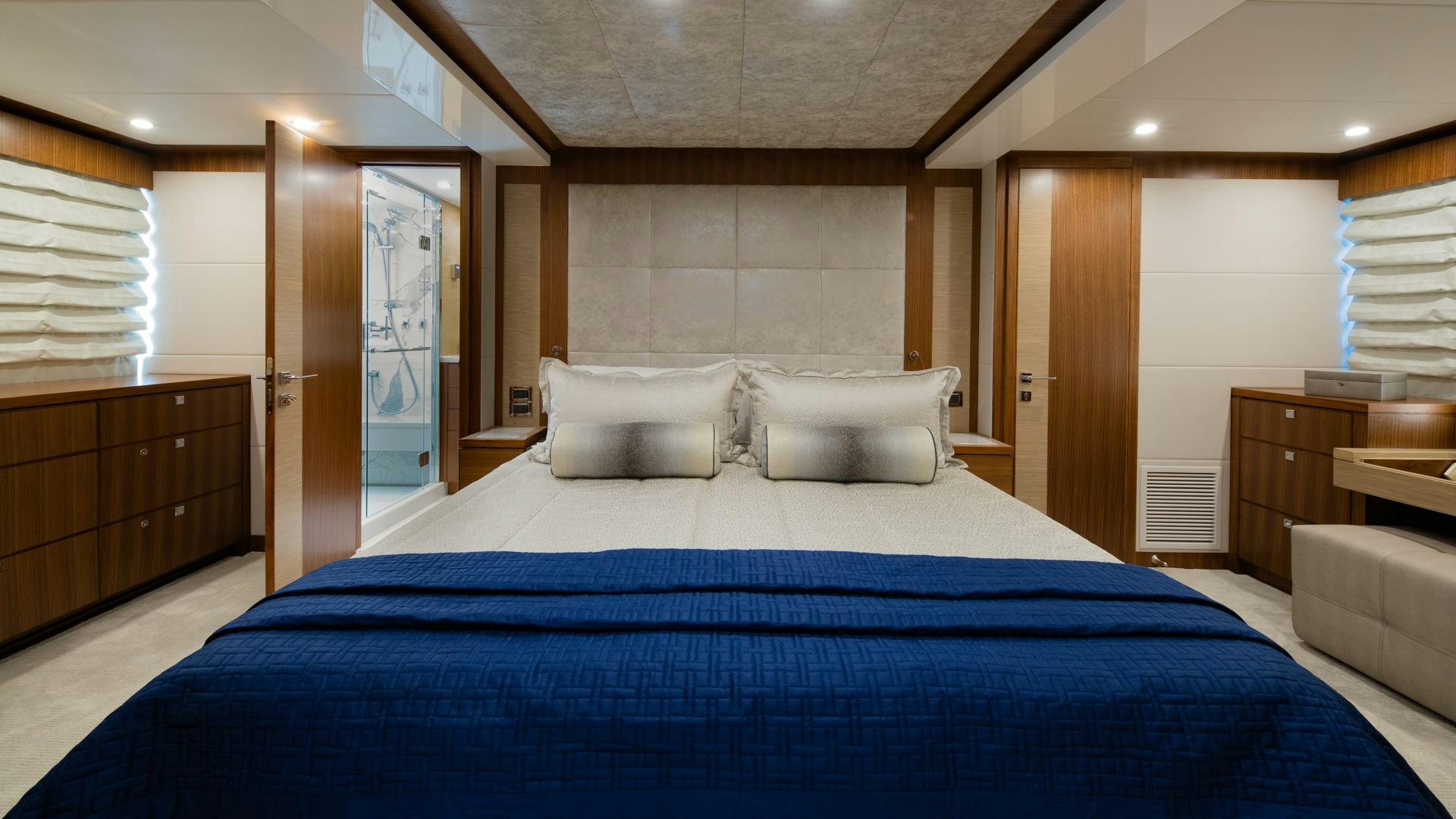 a large bed in a room aboard RISK TAKER Yacht for Charter