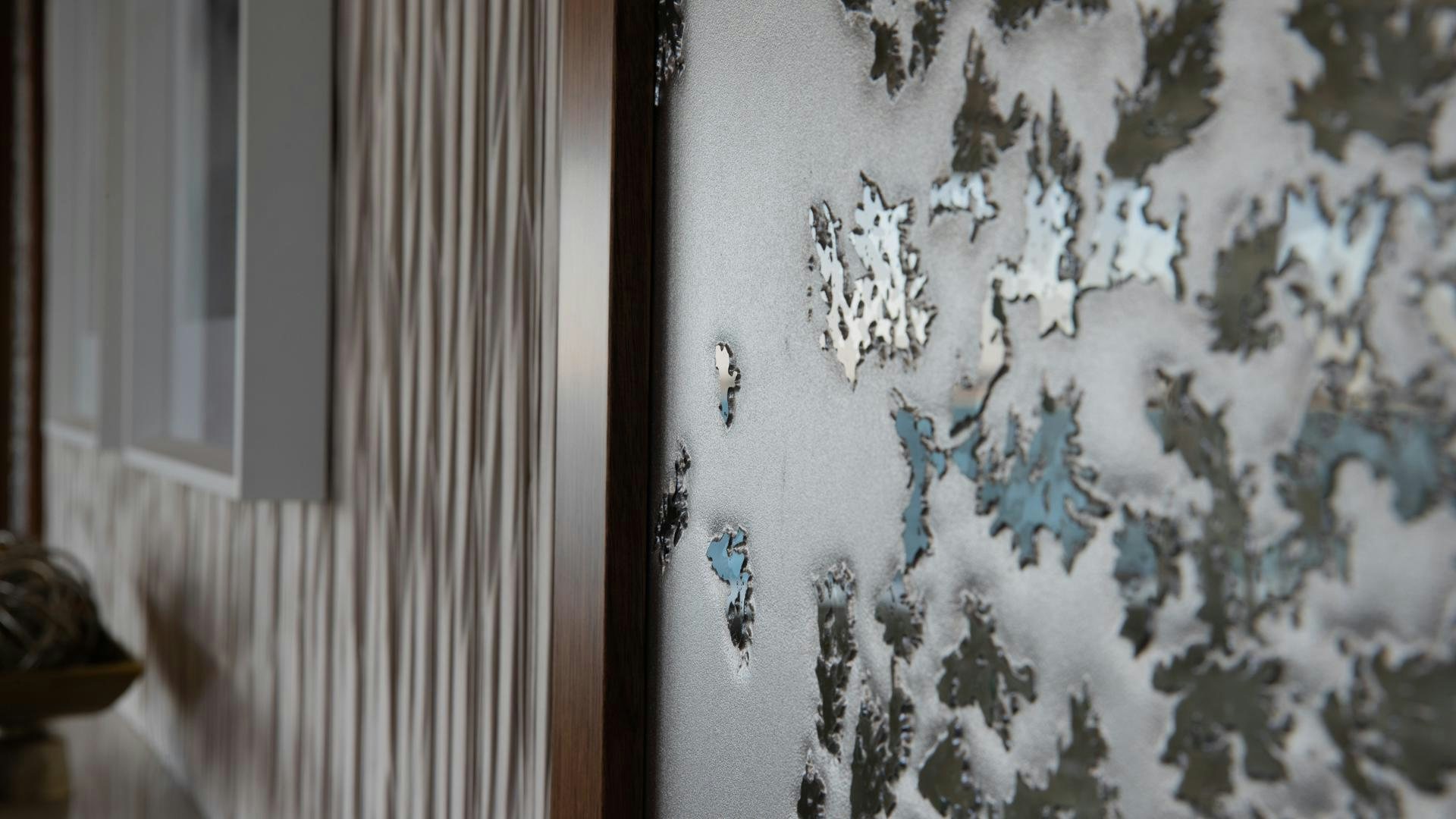 a wall with a painting on it aboard RISK TAKER Yacht for Sale