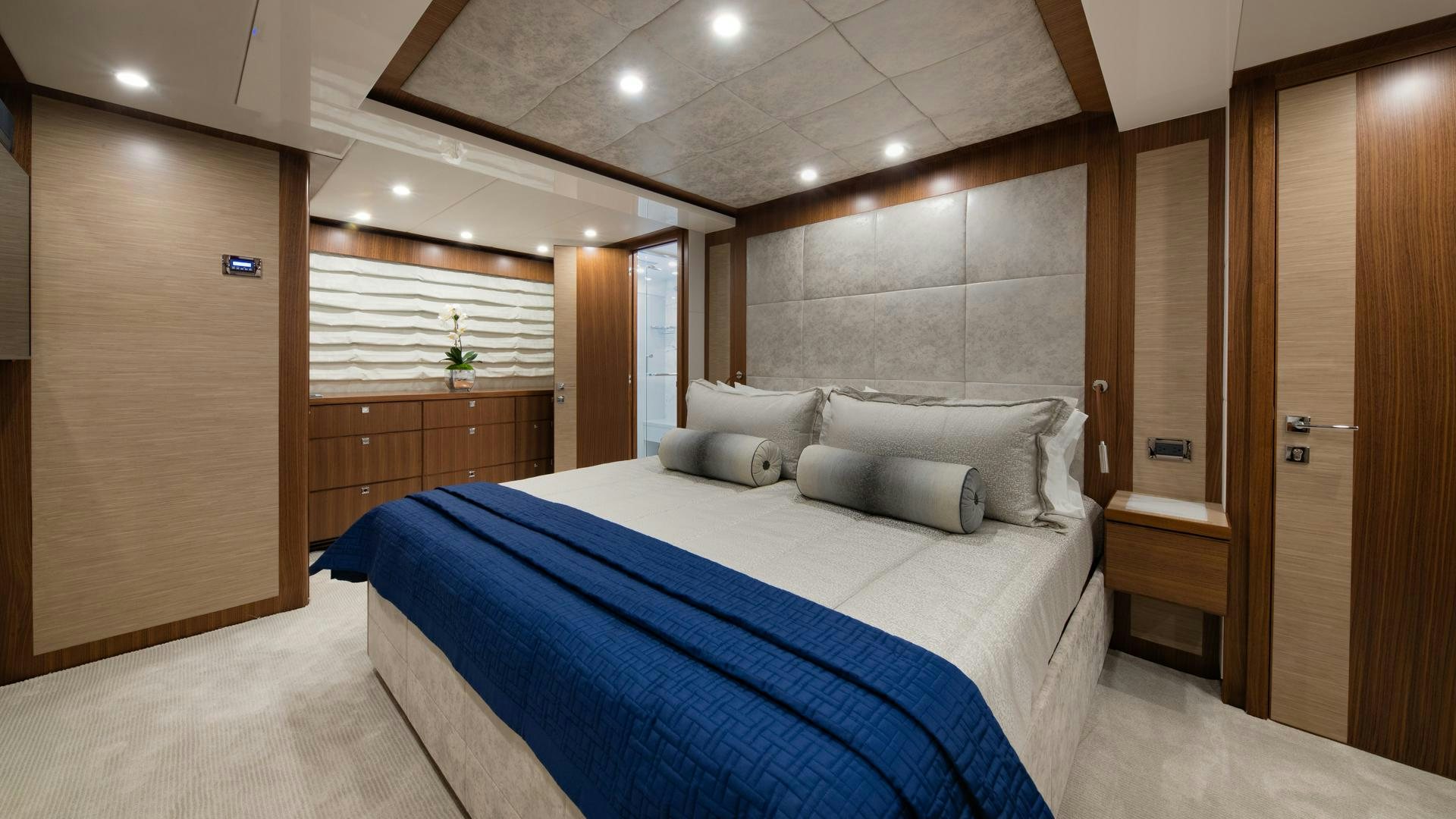 a bed in a room aboard RISK TAKER Yacht for Sale