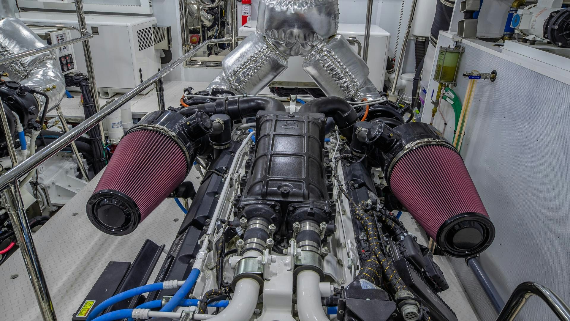 a machine with a large metal cylinder aboard RISK TAKER Yacht for Sale