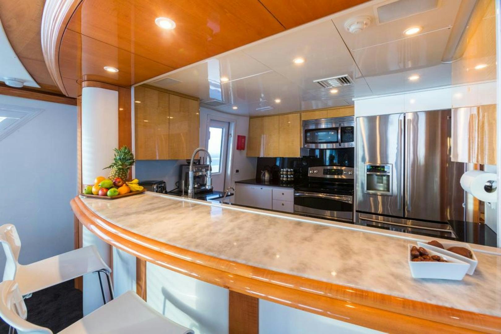 a kitchen with a large island aboard PIRATE RADIO Yacht for Sale