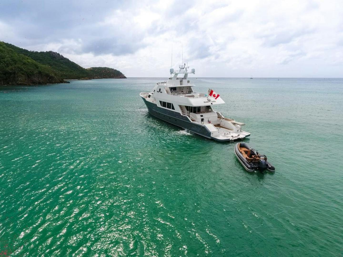 a boat and a helicopter in the water aboard PIRATE RADIO Yacht for Sale
