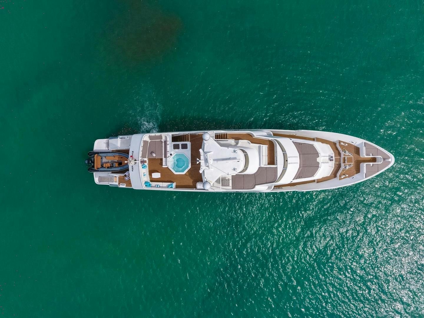 a small metal object on a green surface aboard PIRATE RADIO Yacht for Sale