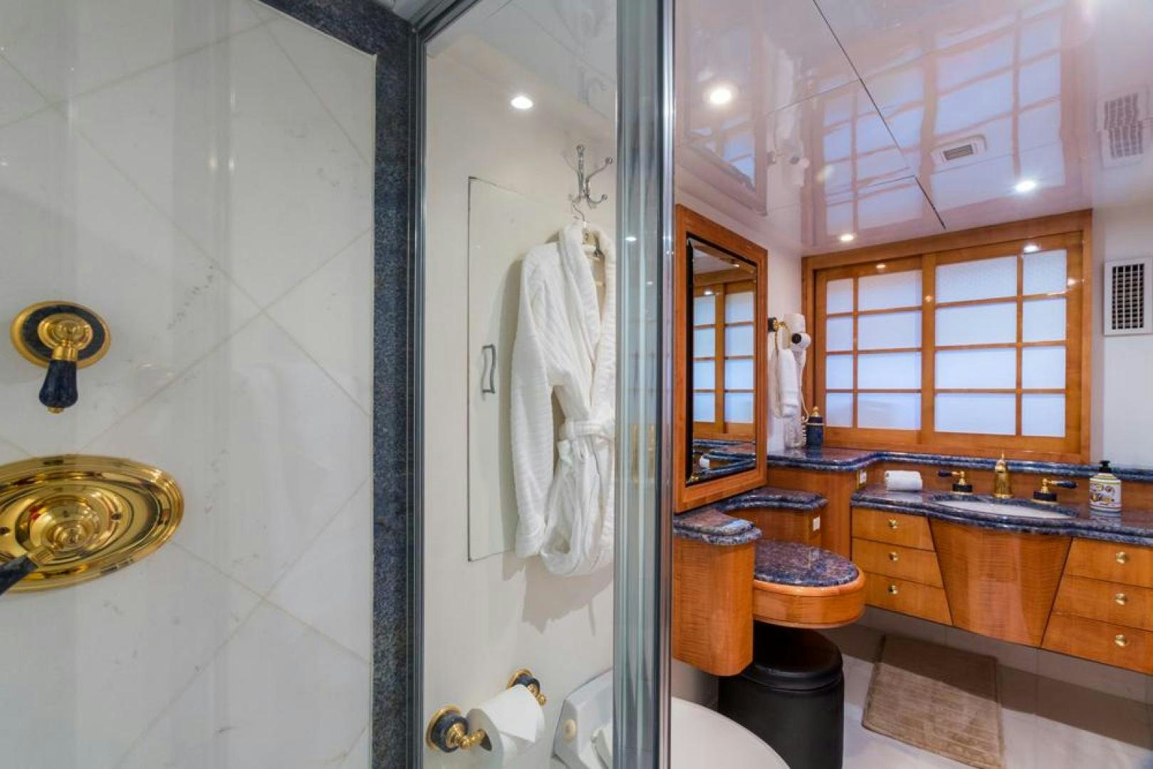 a bathroom with a large mirror aboard PIRATE RADIO Yacht for Sale