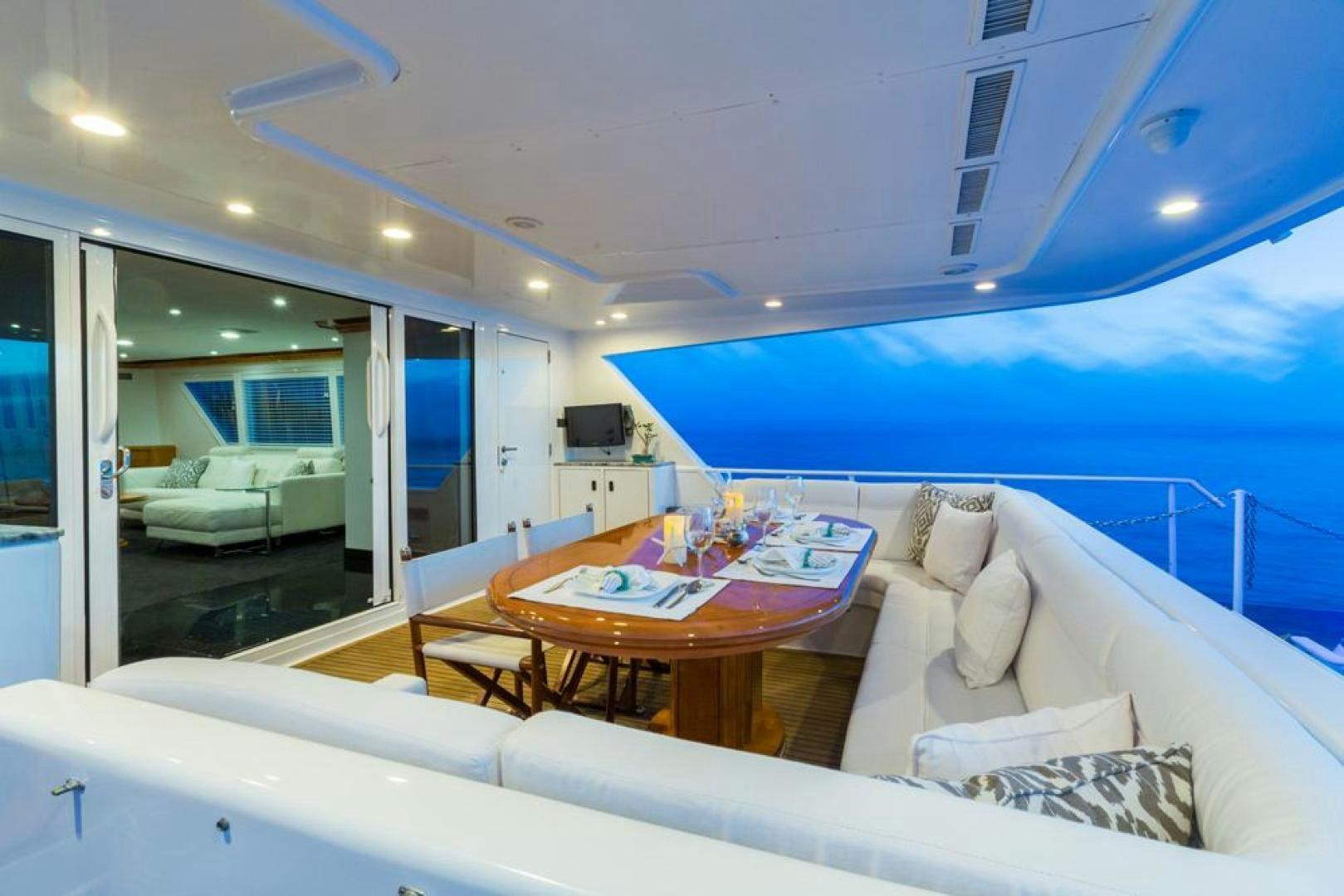 a large living room with a pool aboard PIRATE RADIO Yacht for Sale