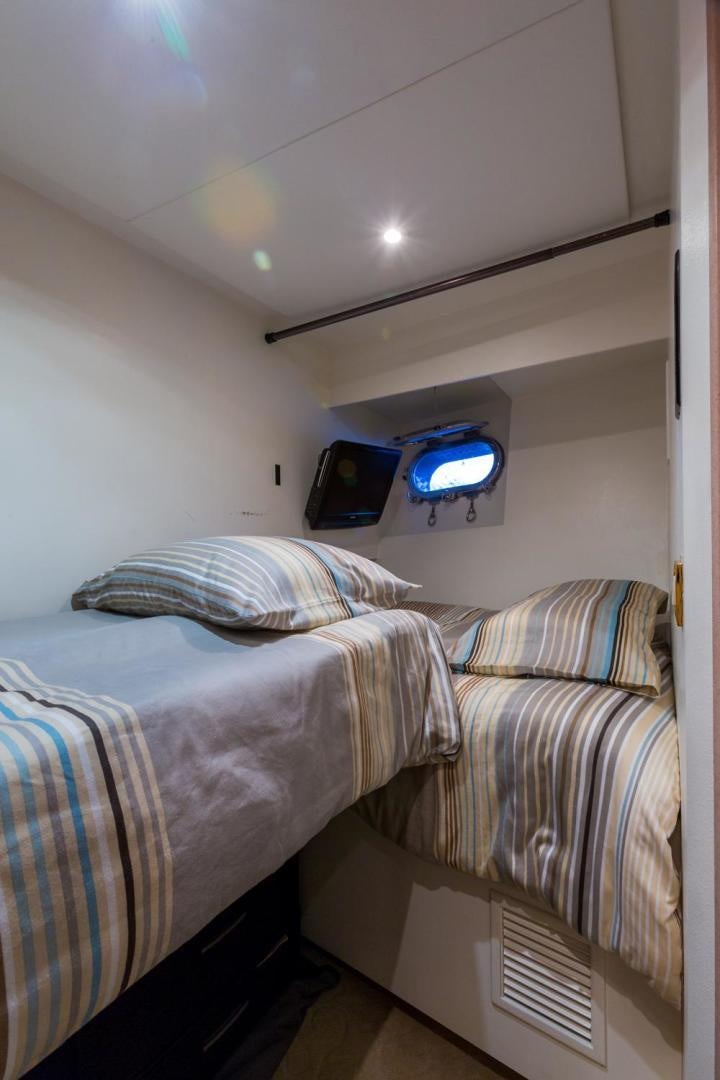 a couple of beds in a room aboard PIRATE RADIO Yacht for Sale
