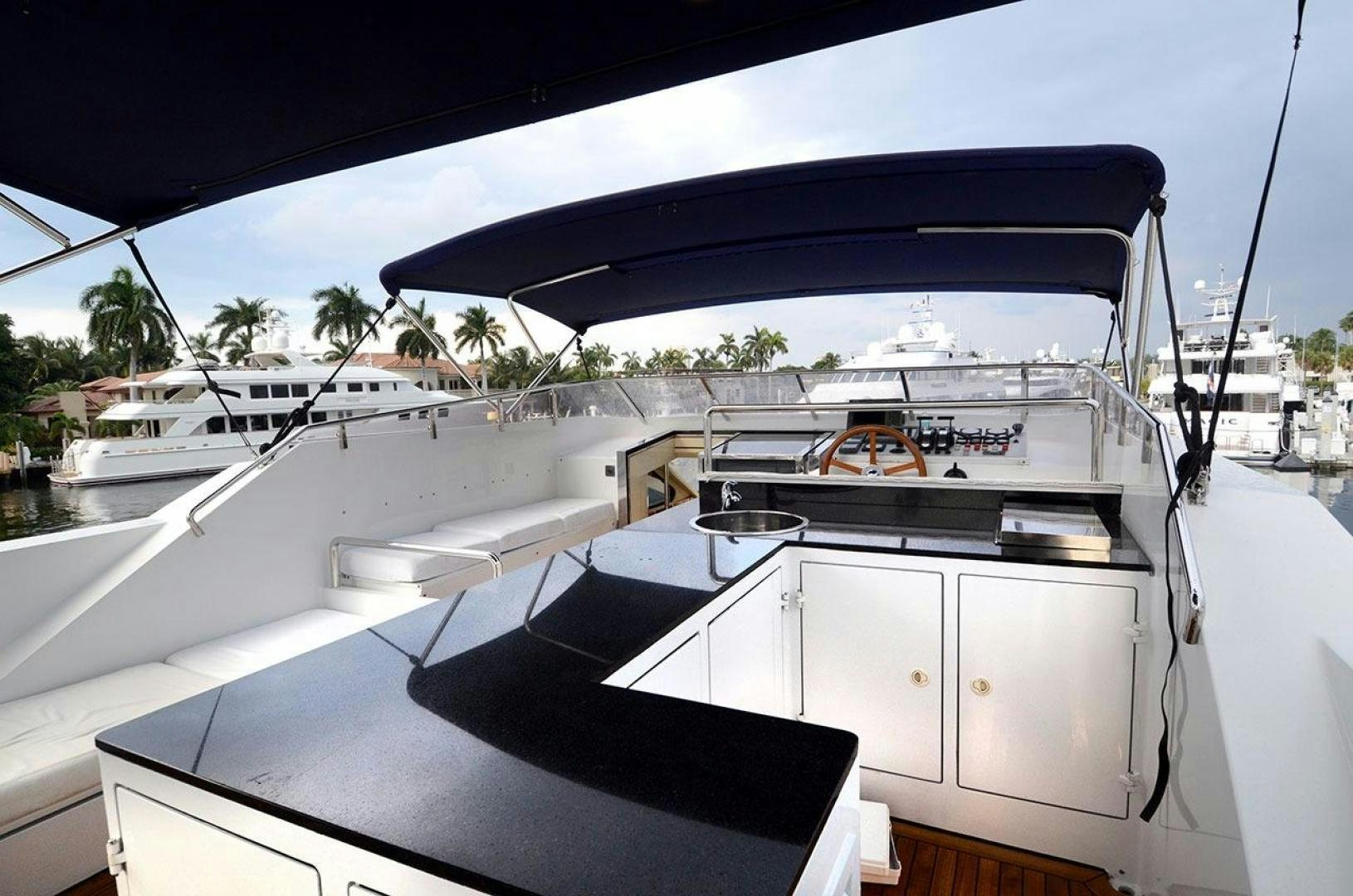 a boat docked at a pier aboard LADY ARLENE Yacht for Sale