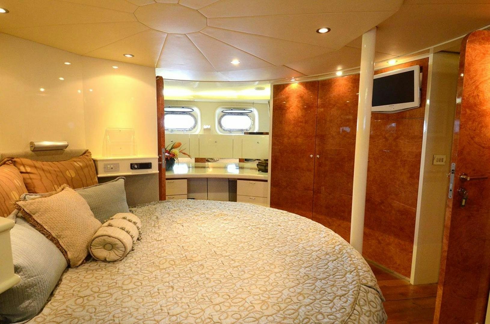 a bed in a room aboard LADY ARLENE Yacht for Sale