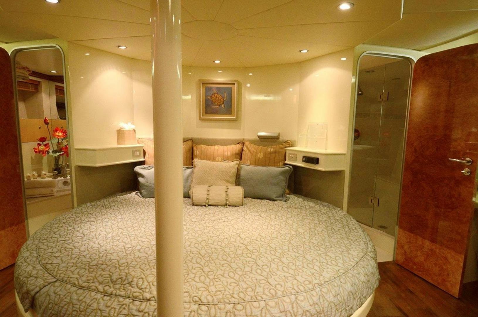 a bedroom with a large bed aboard LADY ARLENE Yacht for Sale