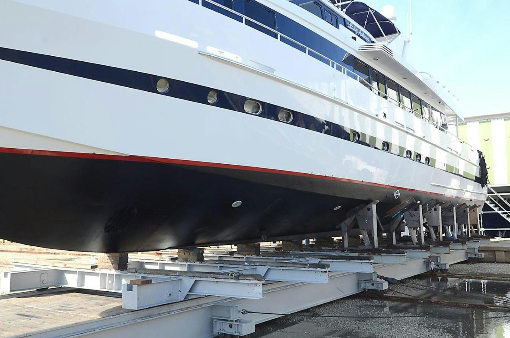 a large cruise ship docked aboard LADY ARLENE Yacht for Sale