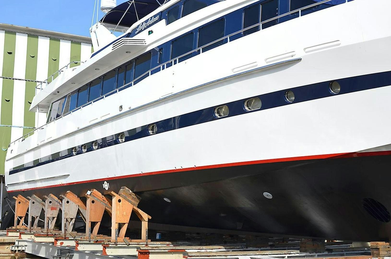 a large cruise ship docked aboard LADY ARLENE Yacht for Sale