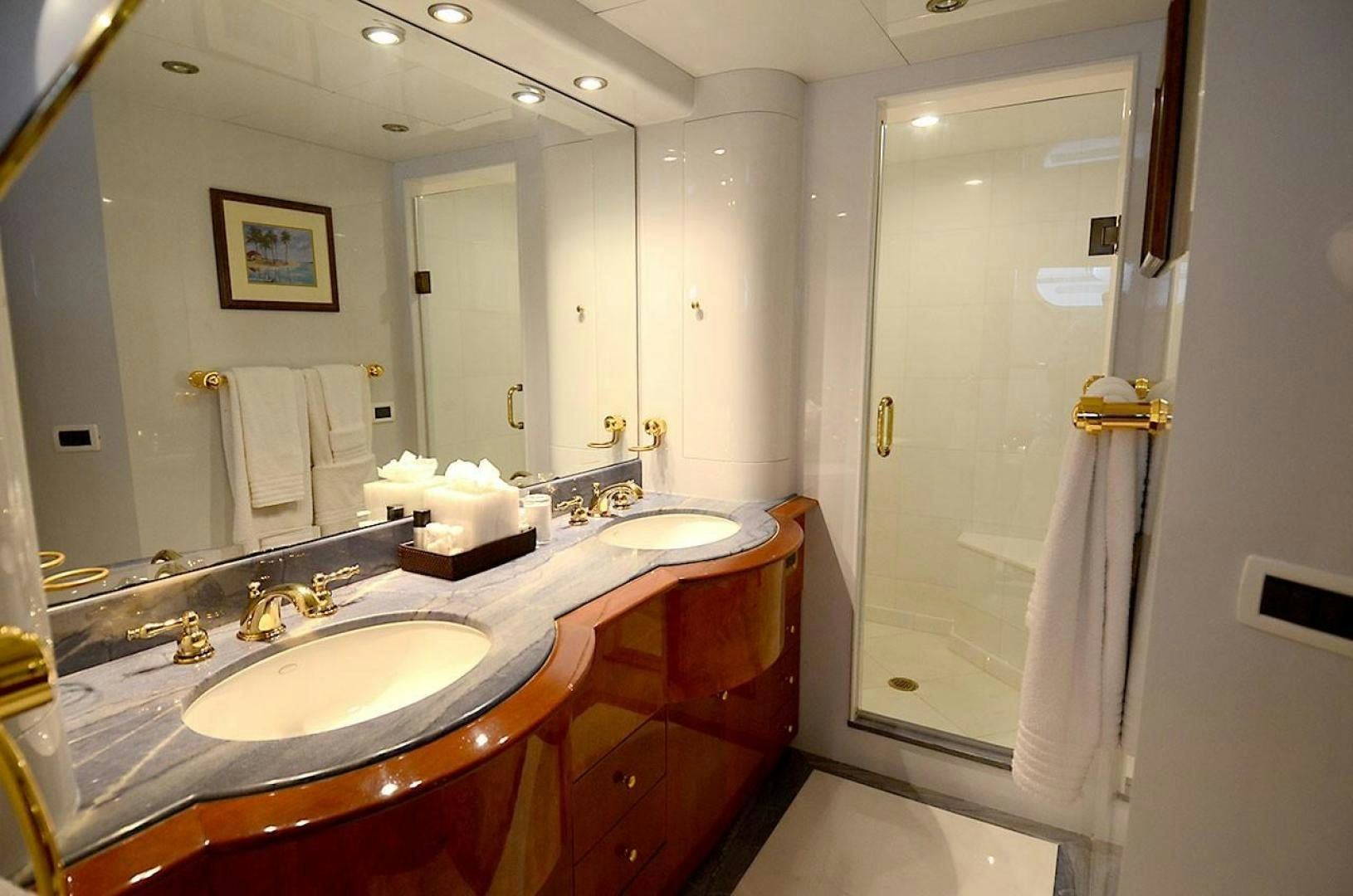 a bathroom with a countertop sink and mirror aboard OUTTA TOUCH Yacht for Sale