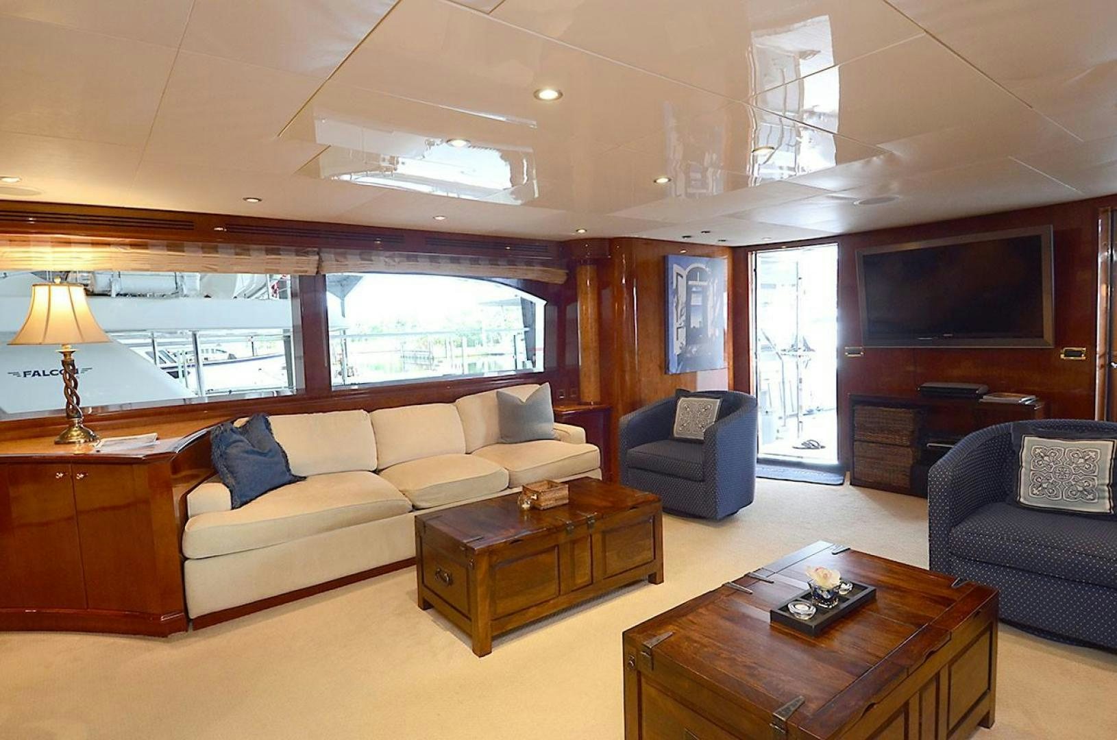 a living room with a couch and a coffee table aboard OUTTA TOUCH Yacht for Sale