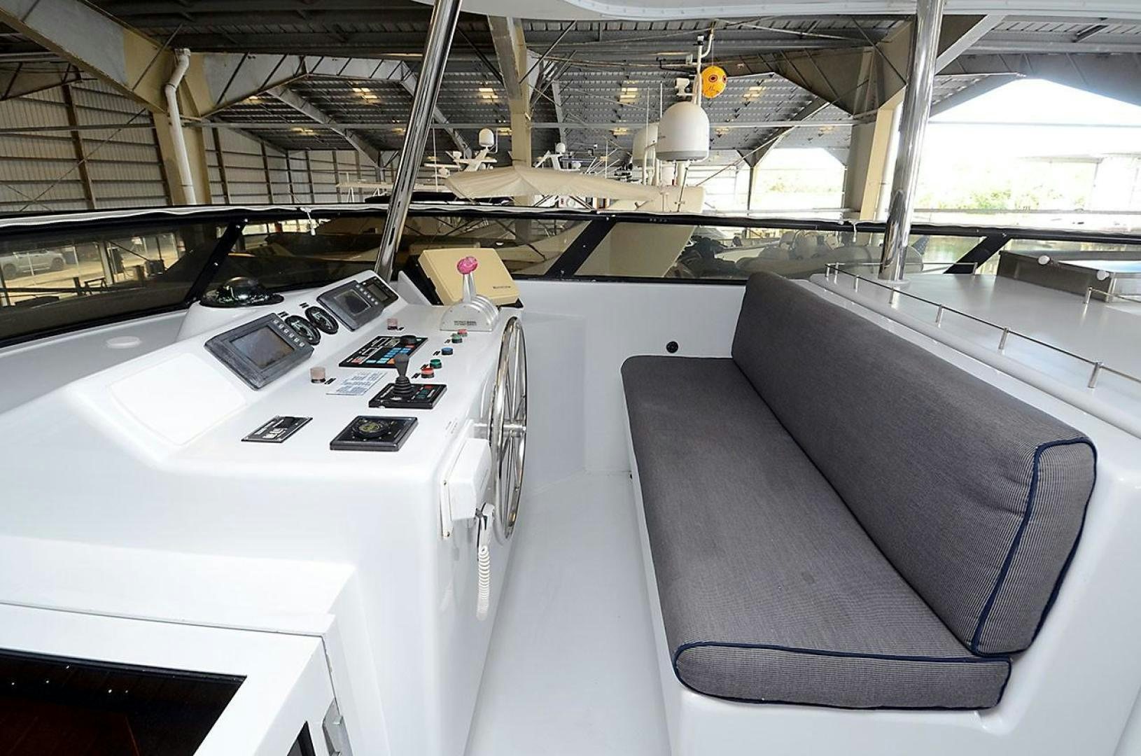a large room with machines aboard OUTTA TOUCH Yacht for Sale