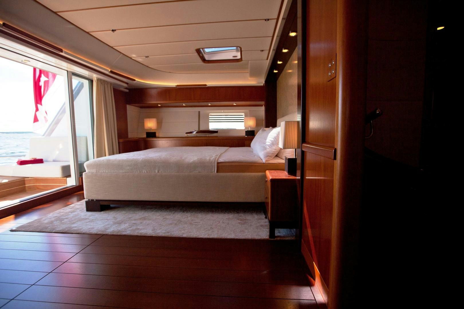 a bed in a room aboard CHILD OF LIR  Yacht for Sale