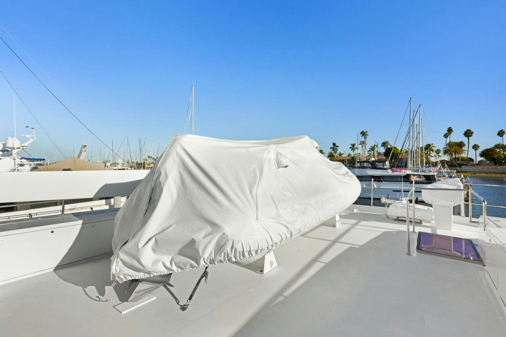 a white tent on a boat aboard ILLEAGLE Yacht for Sale