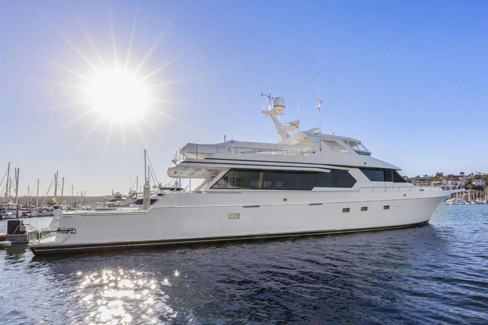 a white yacht on the water aboard AMERICAN MADE Yacht for Sale