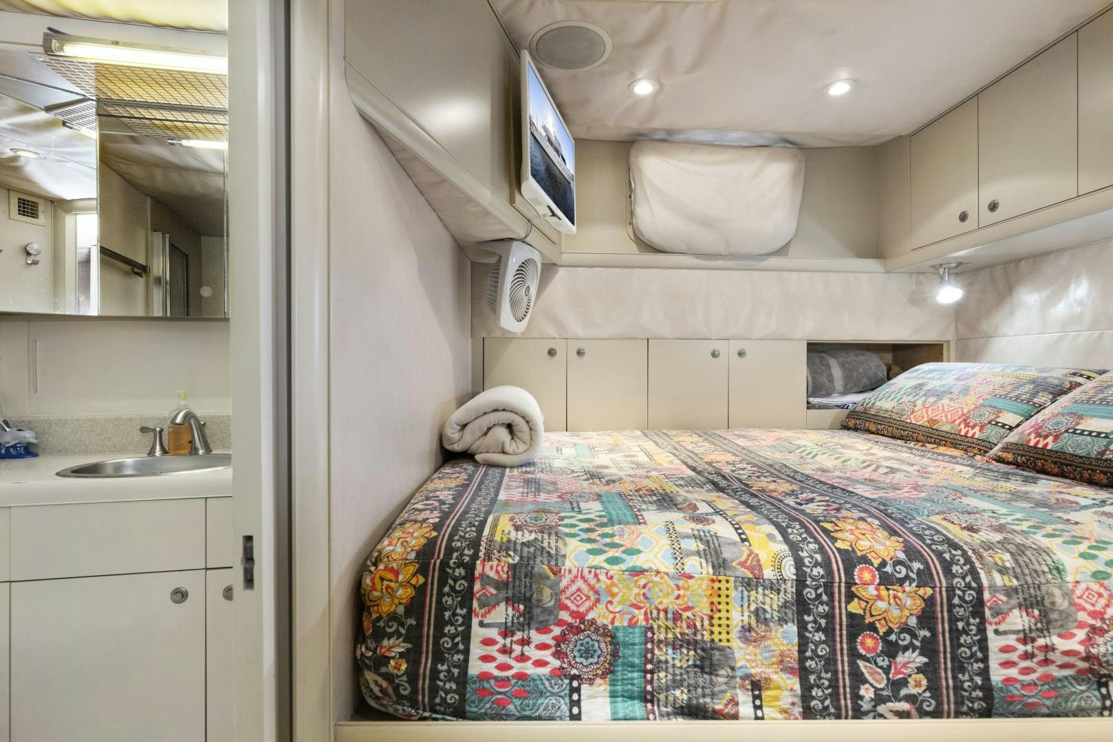 a bed in a room aboard ILLEAGLE Yacht for Sale